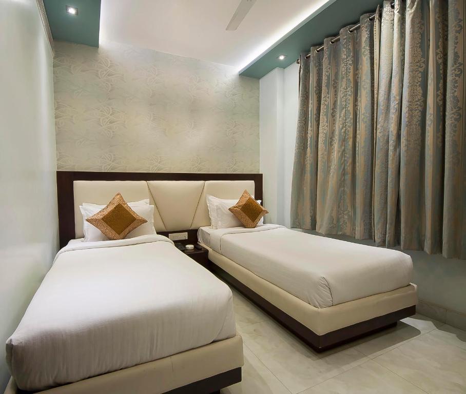 Hotel Central Residency Váránasí Pokoj fotografie
